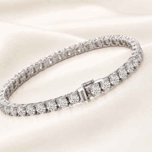 Angled view of Elmivra 18K white gold lab-grown diamond tennis bracelet with round brilliant diamonds