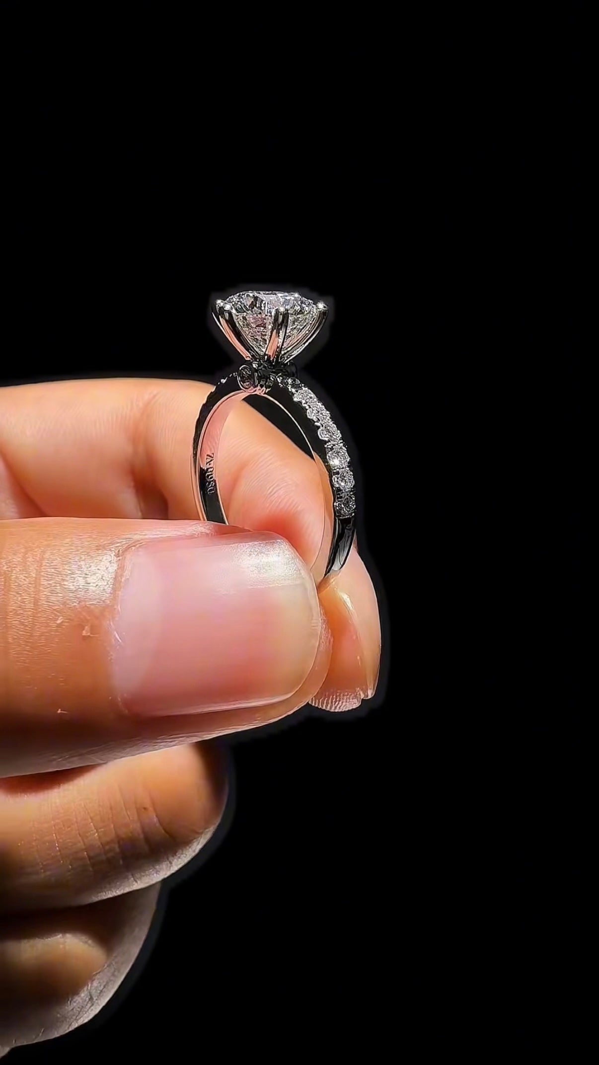 Elmivra 2ct round lab-grown diamond ring with elevated basket and pavé band side detail