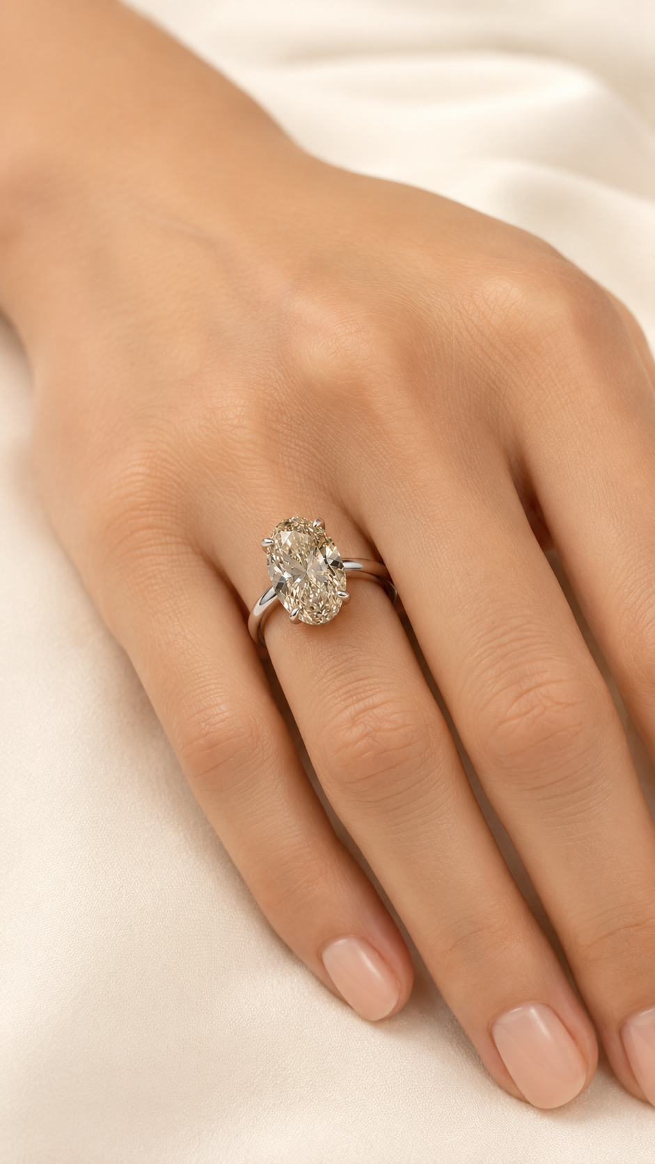 Aura 3 Carat Oval Lab-Grown Diamond Hidden Halo Ring in 18K White Gold model wearing view