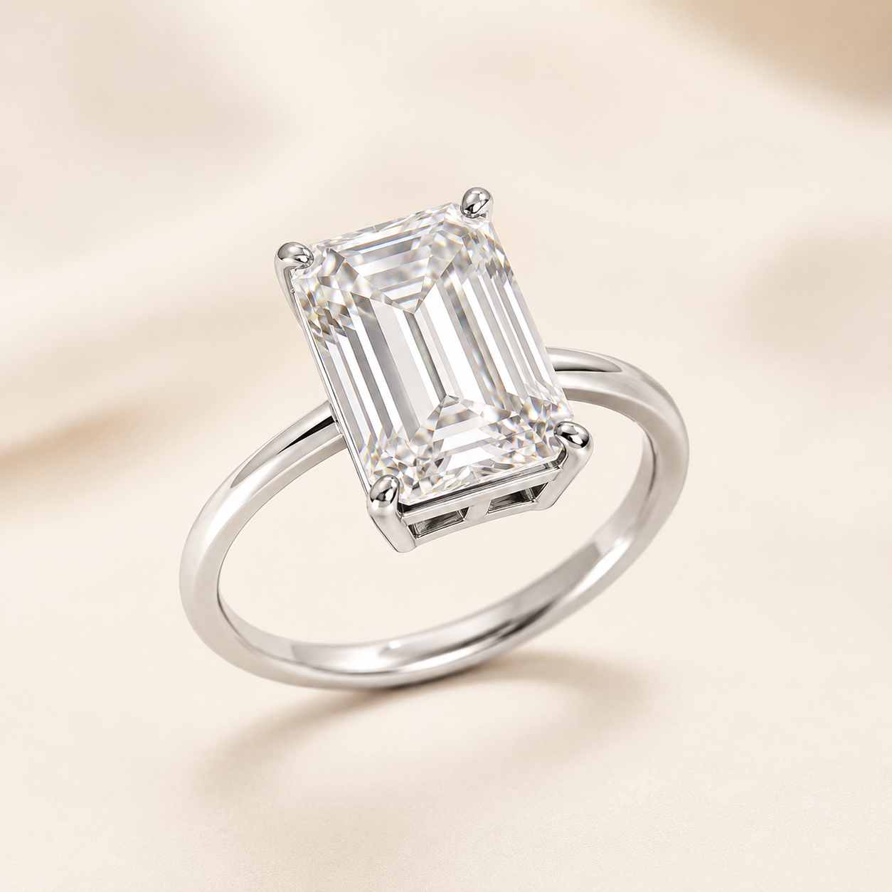 Angled view of 5 carat emerald cut lab-grown diamond ring with solitaire setting