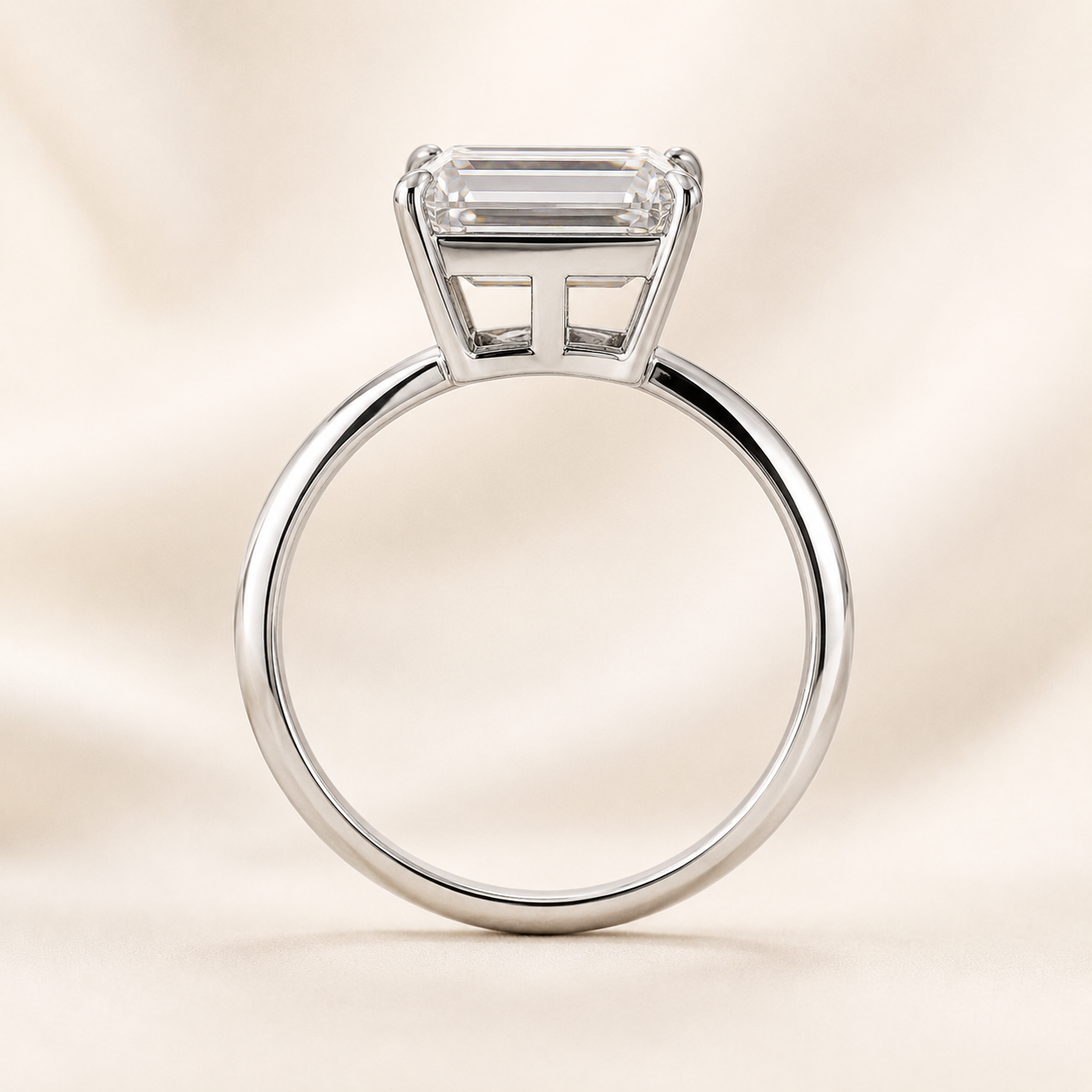 Side detail of 5 carat emerald cut lab-grown diamond ring with elevated open gallery