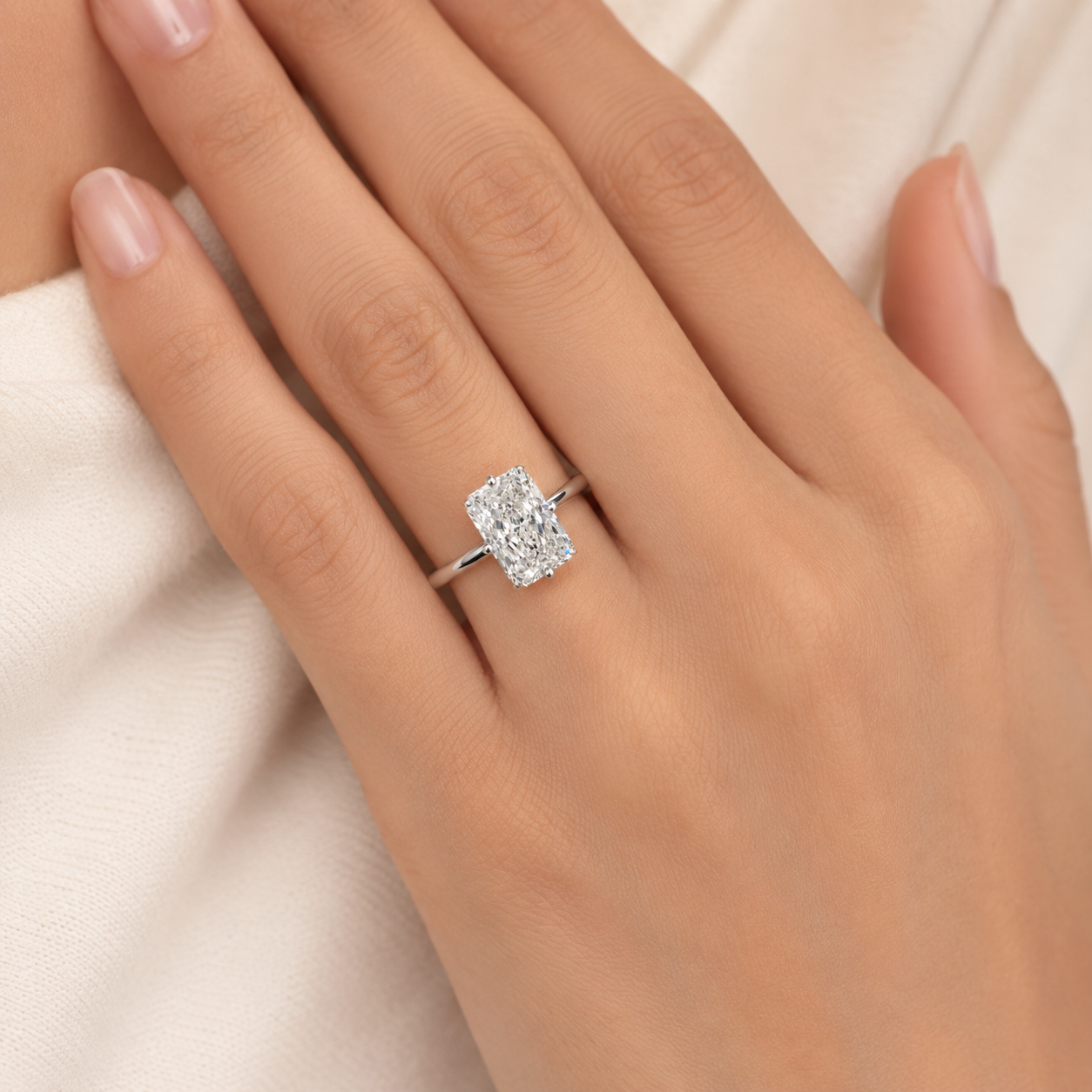 Elmivra 3ct radiant cut lab-grown diamond four-prong solitaire ring model wearing view