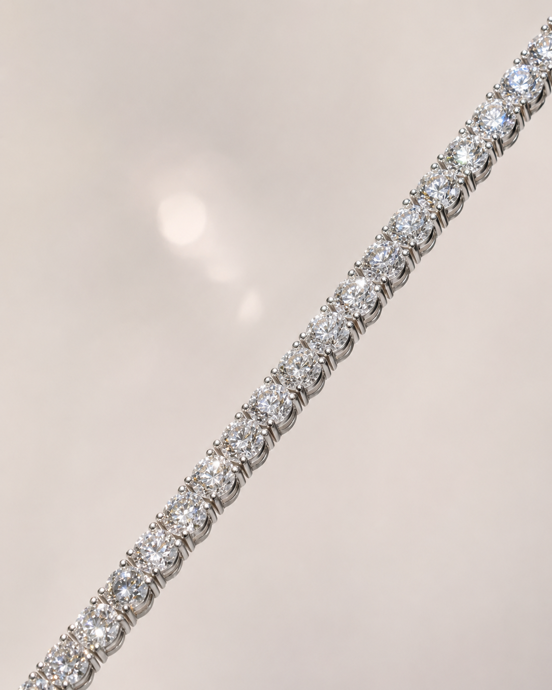 Close-up of Elmivra 18K white gold lab-grown diamond tennis bracelet with D-E color and VS-VVS clarity diamonds
