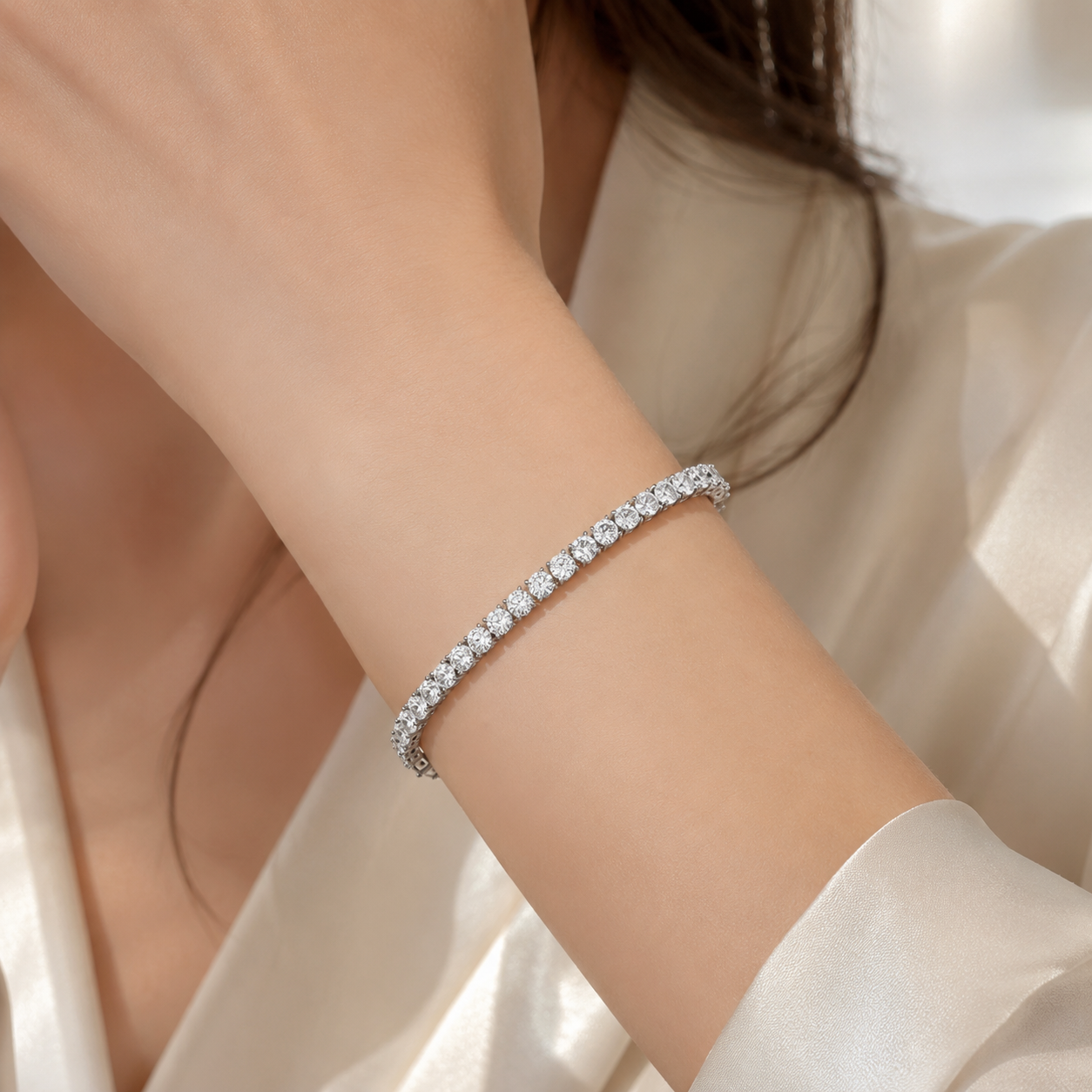 Elmivra lab-grown diamond tennis bracelet worn on wrist in 18K white gold
