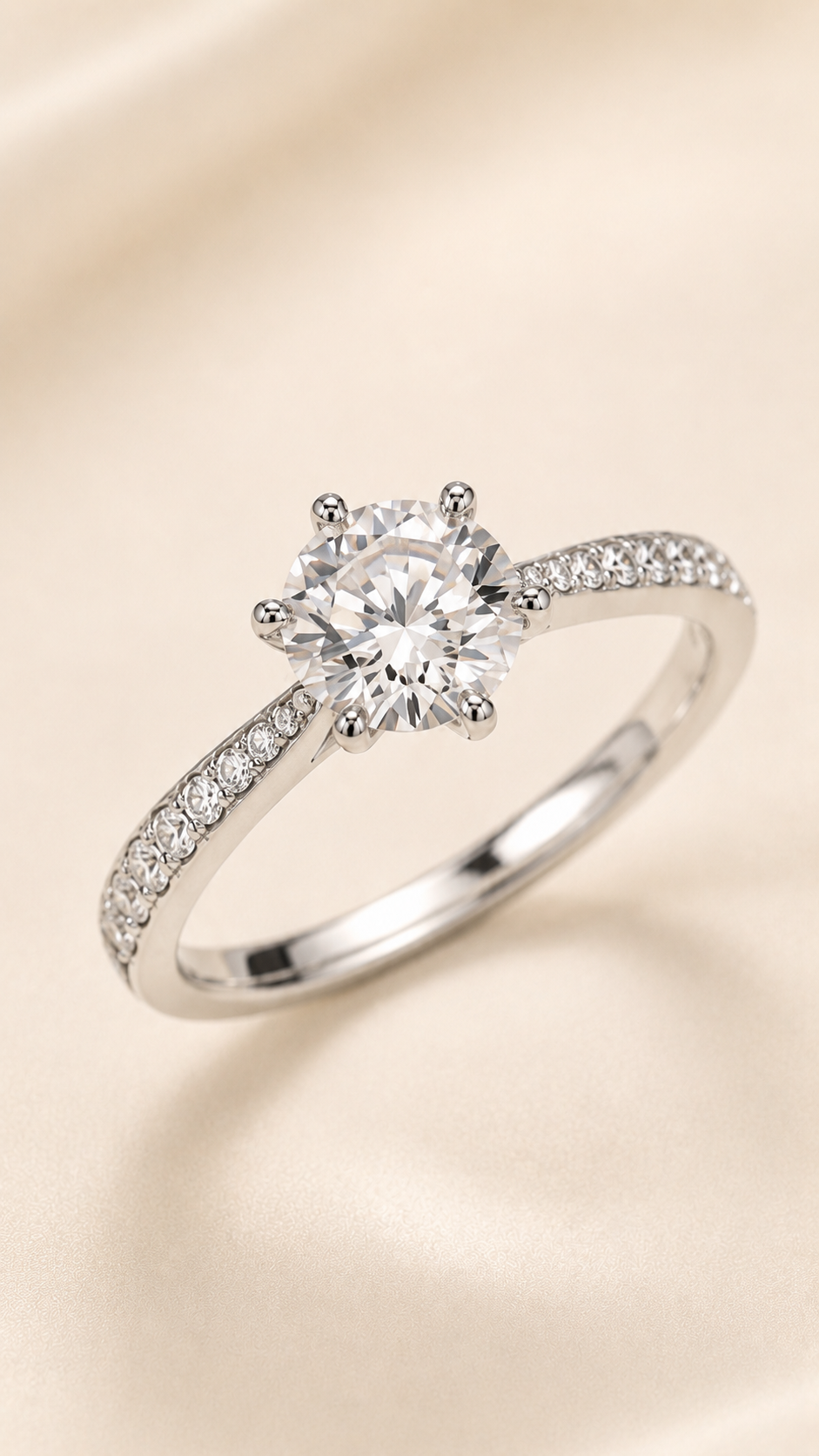Lumière Six-Prong ring angle view showing pavé band and cathedral shoulders