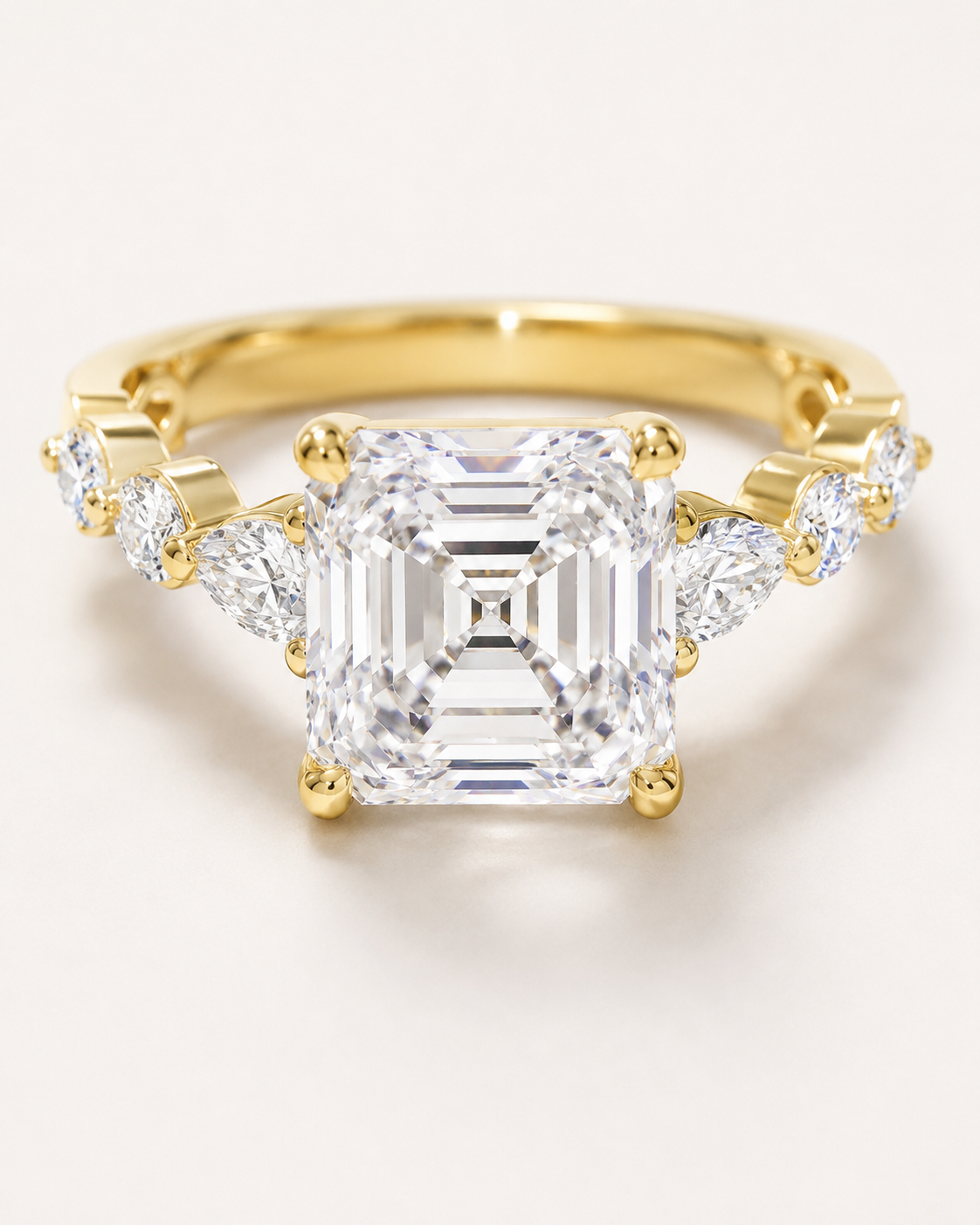 Elmivra Marquise Side Stone Asscher lab-grown diamond ring in 18K Yellow Gold closeup