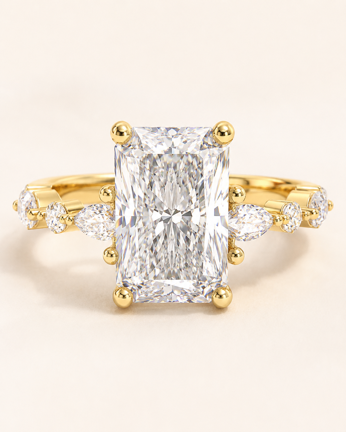 Elmivra Marquise Side Stone Radiant lab-grown diamond ring in 18K Yellow Gold closeup