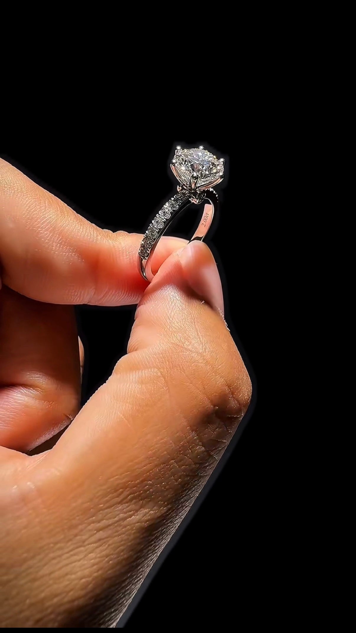 Elmivra 2 carat round IGI-certified lab-grown diamond ring with pavé band angled view